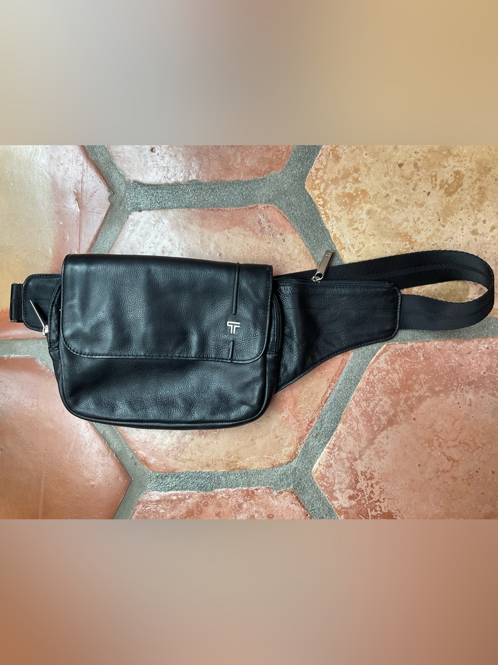 Black Leather Crossbody Sling Bag by Tumi unisex